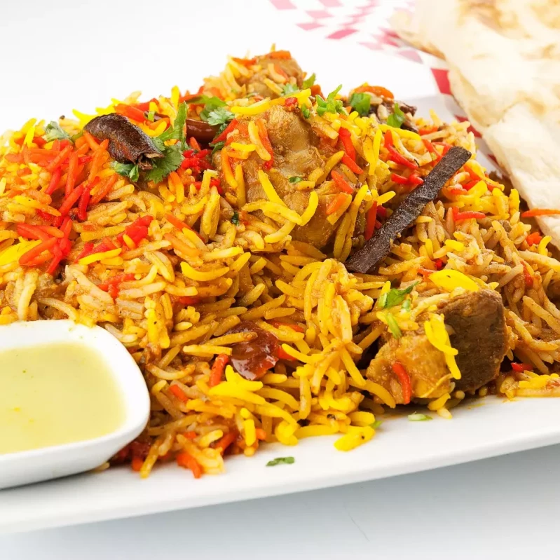Chicken Dum Biryani - traditional slow-cooked rice at Indian BBQ & Grill Red Deer